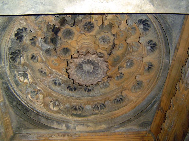 A lotus pendant hangs from the ceiling of the dome visible in the pictures of the temple's east side.