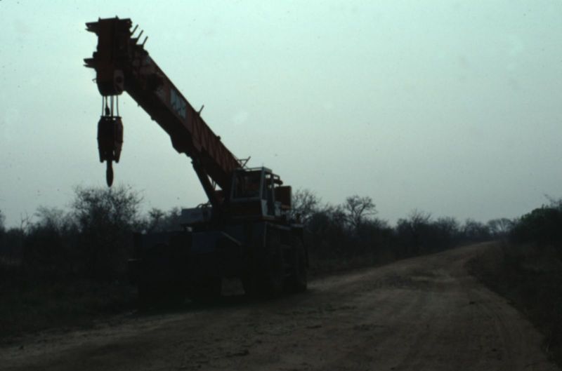 On the same road: an abandoned crane.

The British built other roads in southern Sudan, too. Here's a note about the opening of one running 