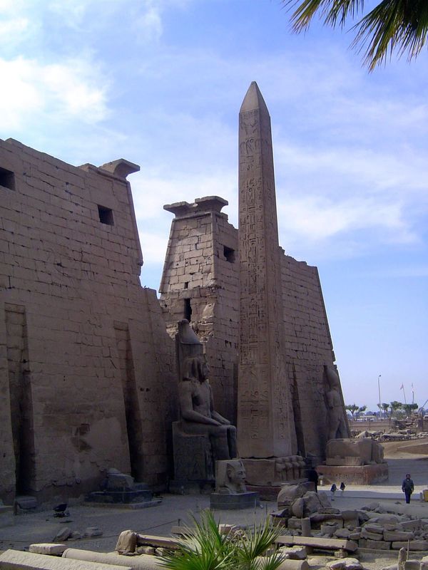The first pylon of Luxor Temple stands at the southern end of the avenue of sphinxes. Rameses II—19th Dynasty, 13th Century B.C.—gazes here 