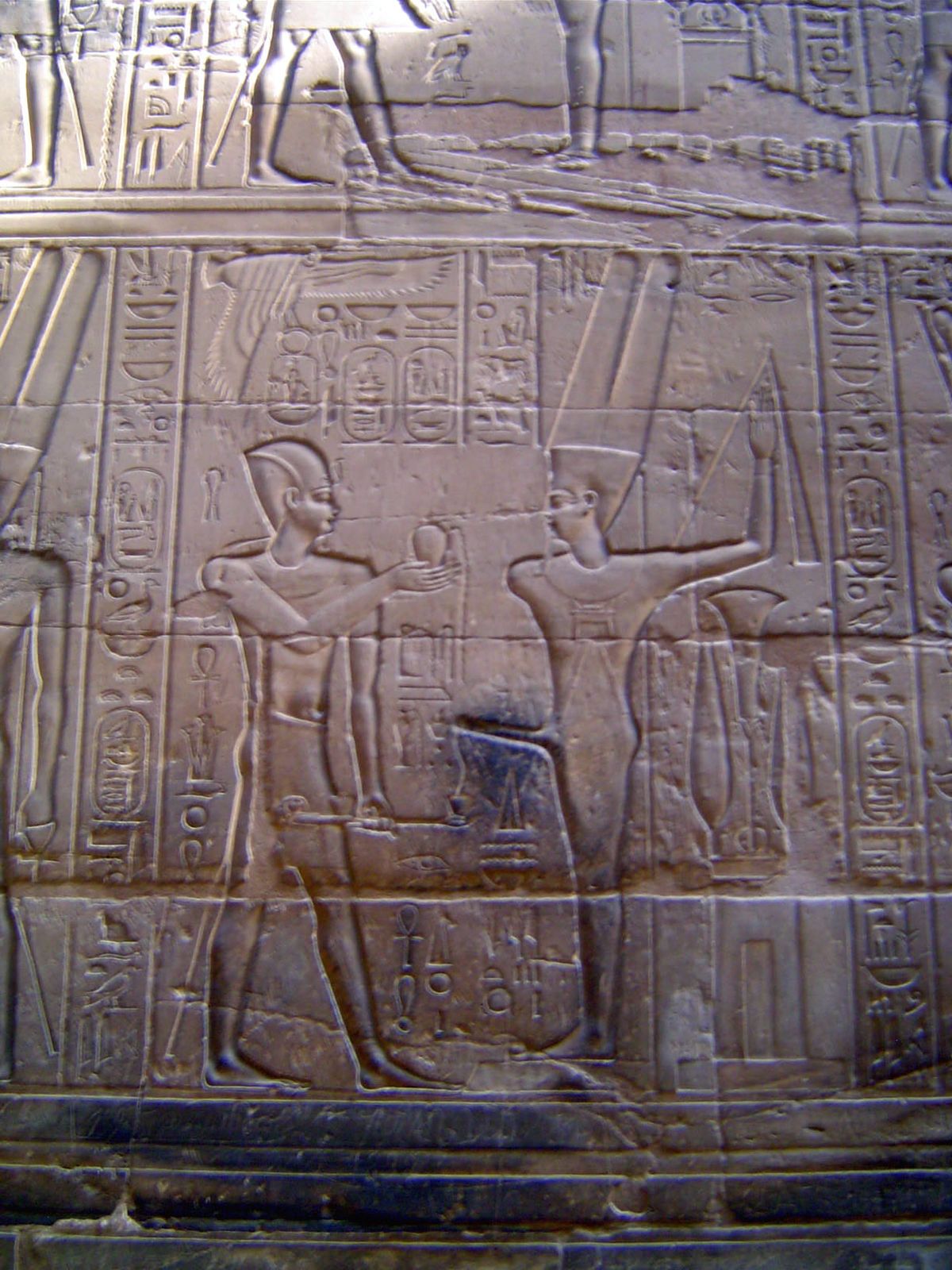 Here, Alexander makes an offering to him.
