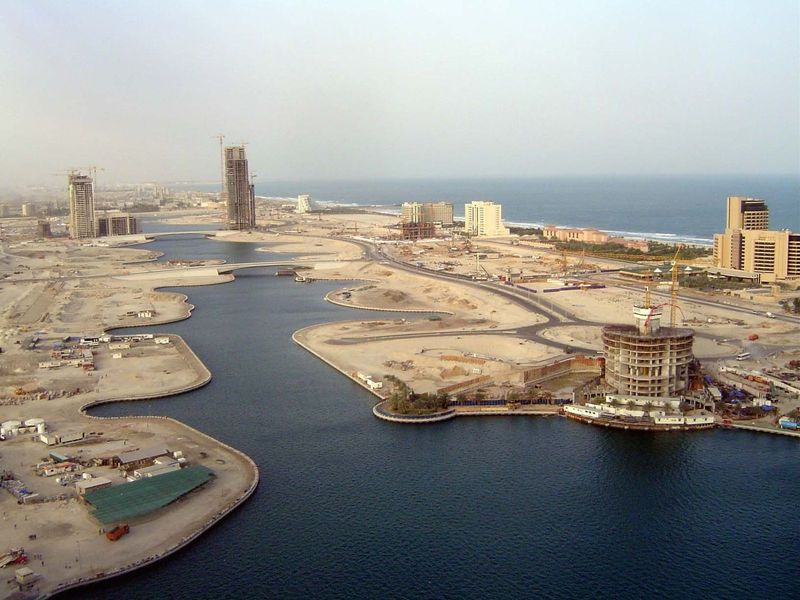 The sand once continued to the sea, but now the coastline has been altered with the construction of this artificial waterway the West Side M