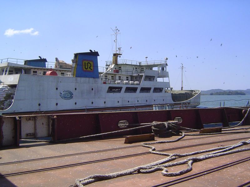We're looking from the deck of the same ship toward a neighbor that is still in service and is loading up with cottonseed bound for Mwanza, 
