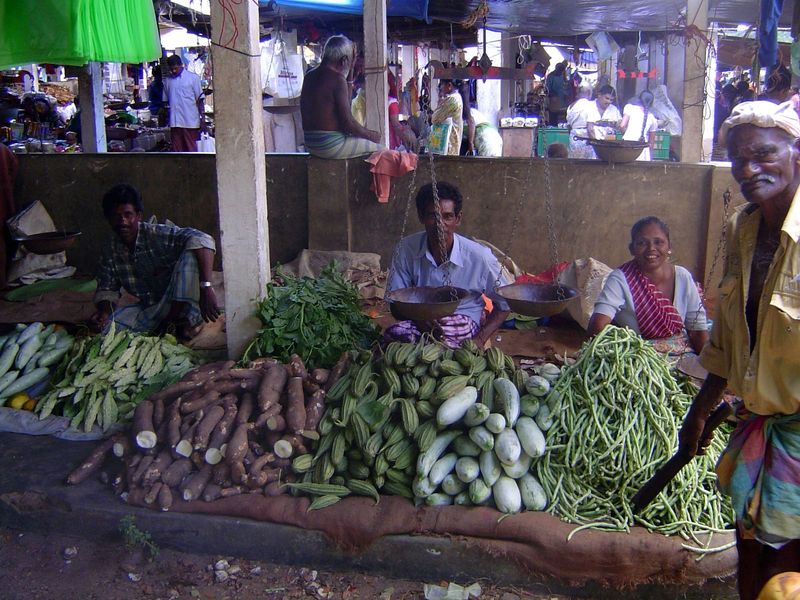 The competition. The gentleman on the right, wielding the wicked knife, was selling coconuts.