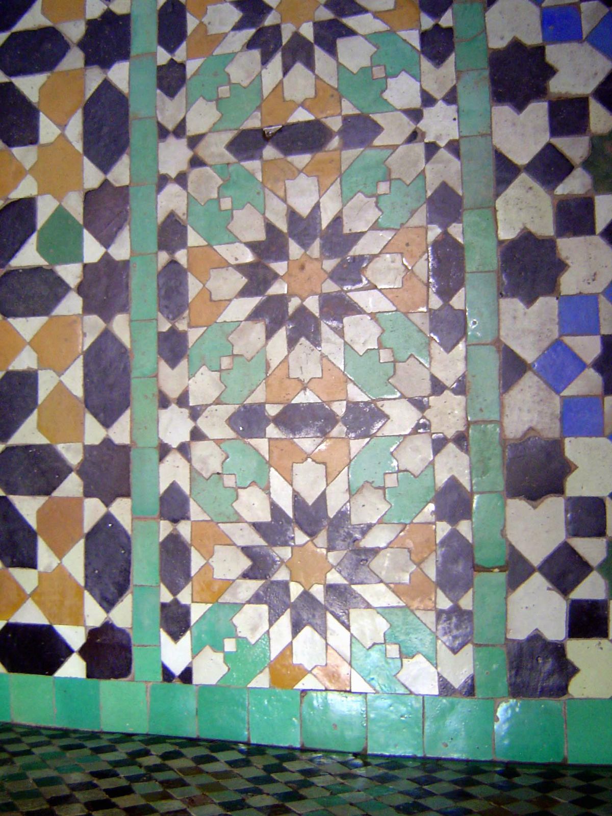 The entrance hall is decorated with zillij, faience tile used on both floors and walls.
