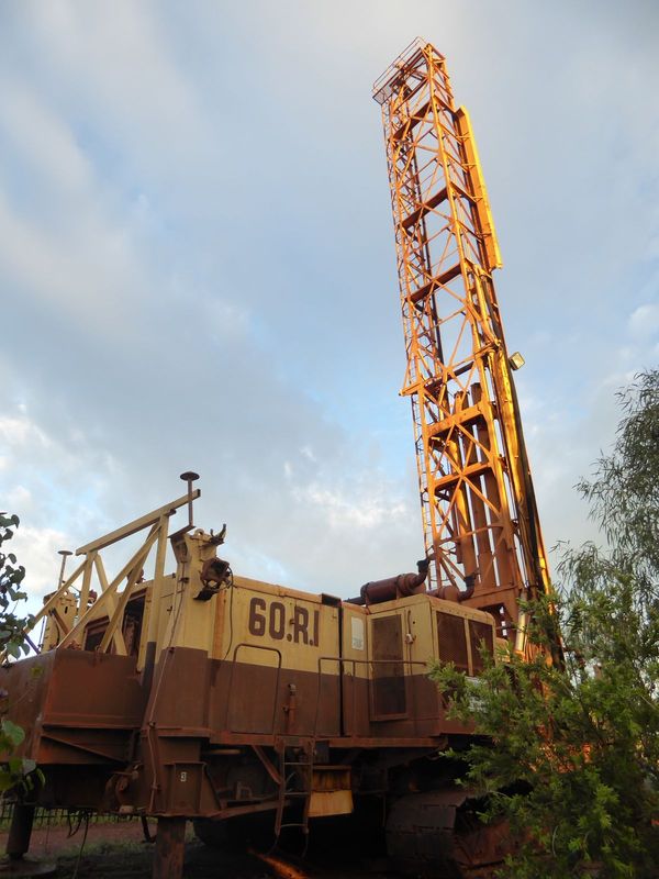 Like it when I sound techie? Here goes: this is a Bucyrus-Erie drill that makes 38 centimeter blast holes loaded with a mix of ammonium nitr
