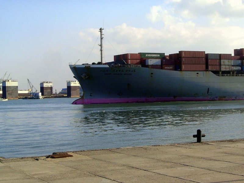A container ship heads the other way.