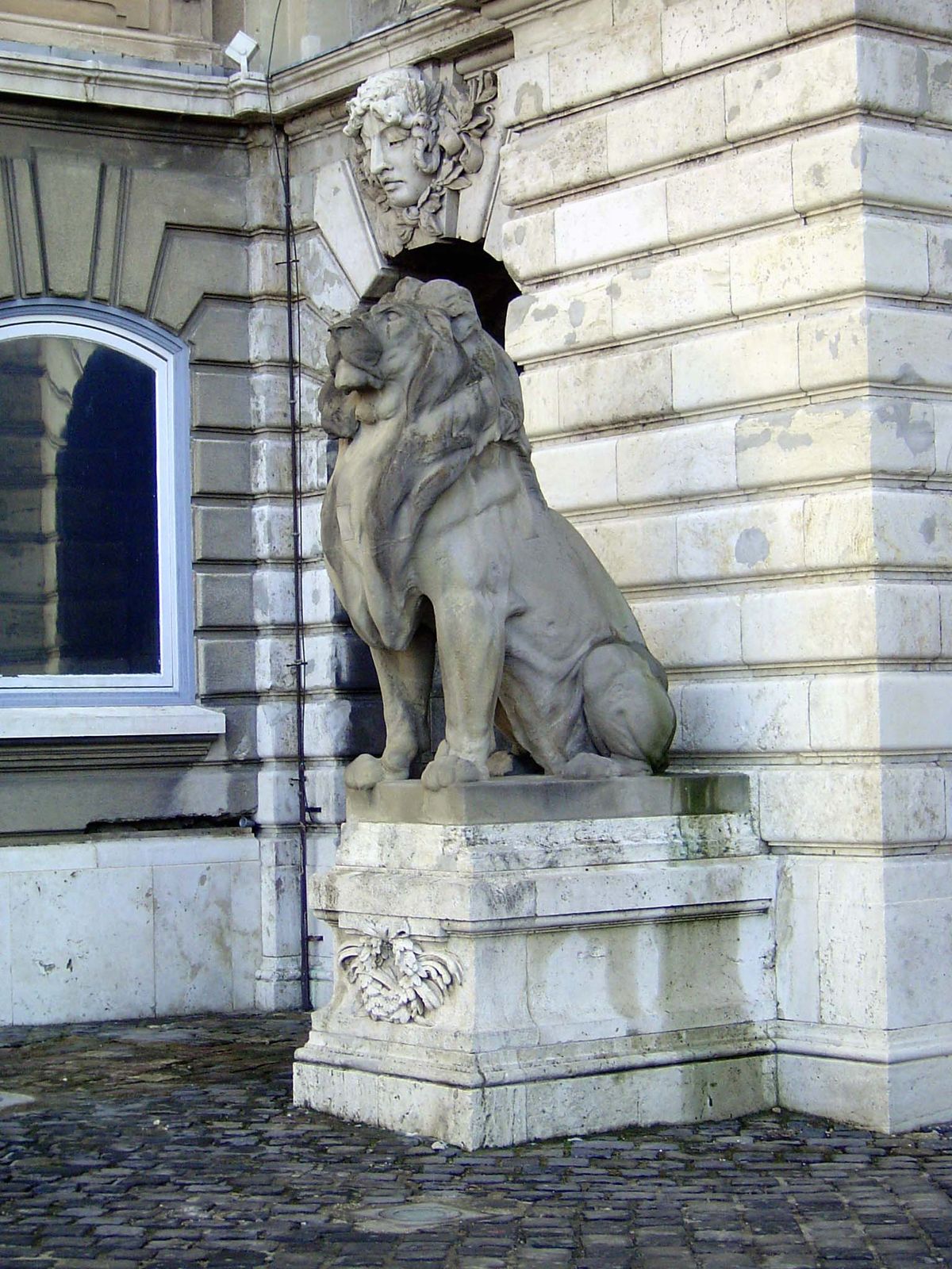 One of several lions by Janos Fadrusz, 1901. A nice illustration of pride so great that its possessor can hardly take a step without stumbli
