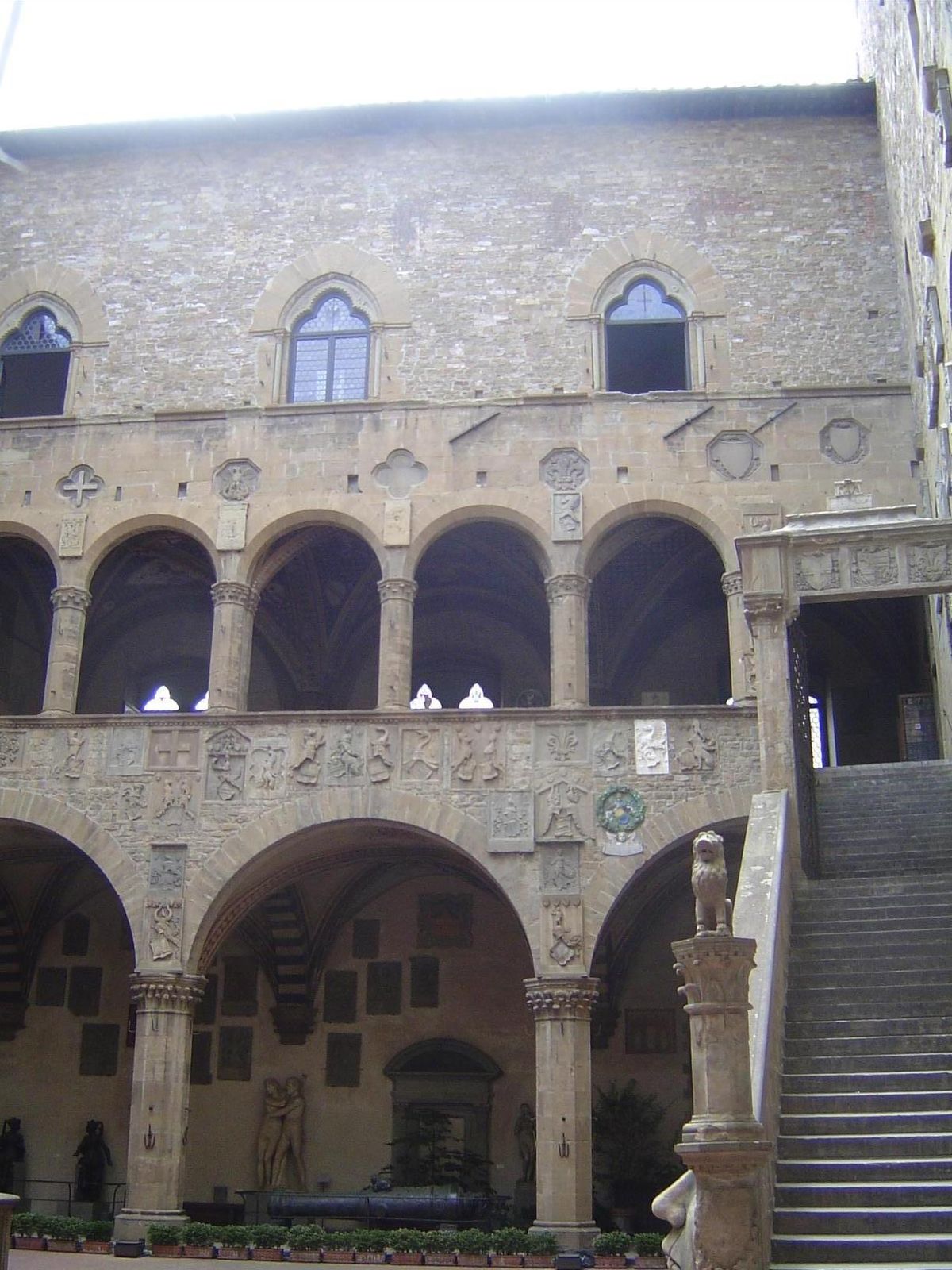 Inside, there's a cortile, or courtyard, with stairs to the grand rooms on the piano nobile.
