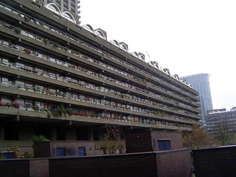 The estate also contains lower buildings like this one, "massive far beyond utility" in Pevsner's words. The architects were Chamberlin, Pow
