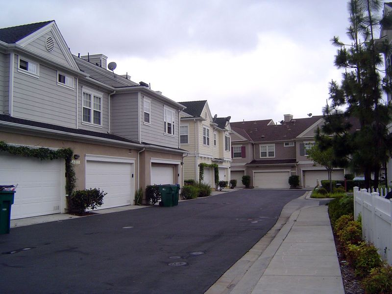 The secret is out back, where even through those garage doors you can hear SUV's growling.