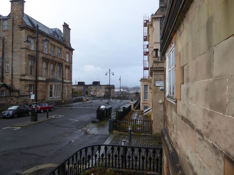 And here's the view from as close to it as a tramp can get. The view is toward a broad flight of stairs. The river, lost in the distance, is