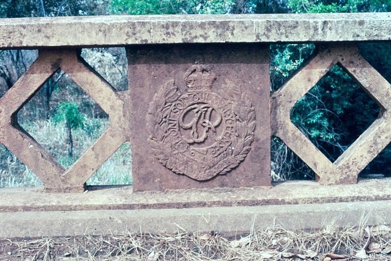 George Rex, with crown and laurels, cast in the bridge railings. The same insignia can be found in lots of other countries around the world,