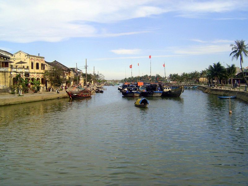 Hoi An at last: the Thu Bon River. Looks like a tinted postcard from 1900.