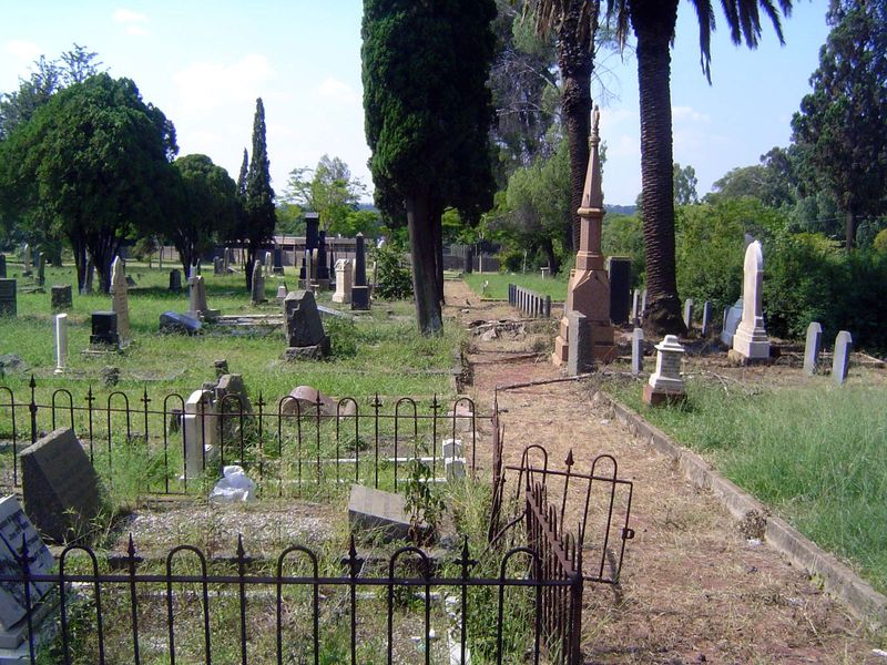 Another block west: a cemetery in poor shape.