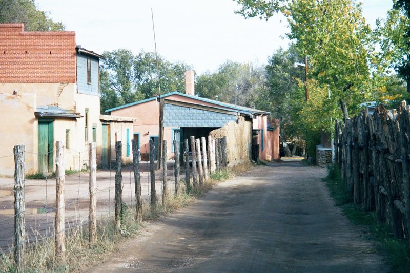Wealth doesn't always look the part. Here's Gormley Lane, stretching north to Canyon Road. The Santa Fe River is straight ahead, flowing rig