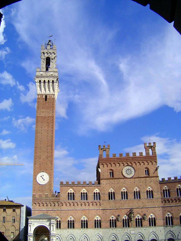 The Palazzo Publico, built in the first half of the 14th century. Lippo Memmi's famous Torre del Mangia was built just before the arrival of