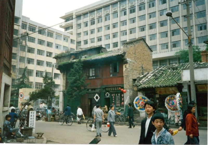 A modern city was emerging from the body of a traditional one.