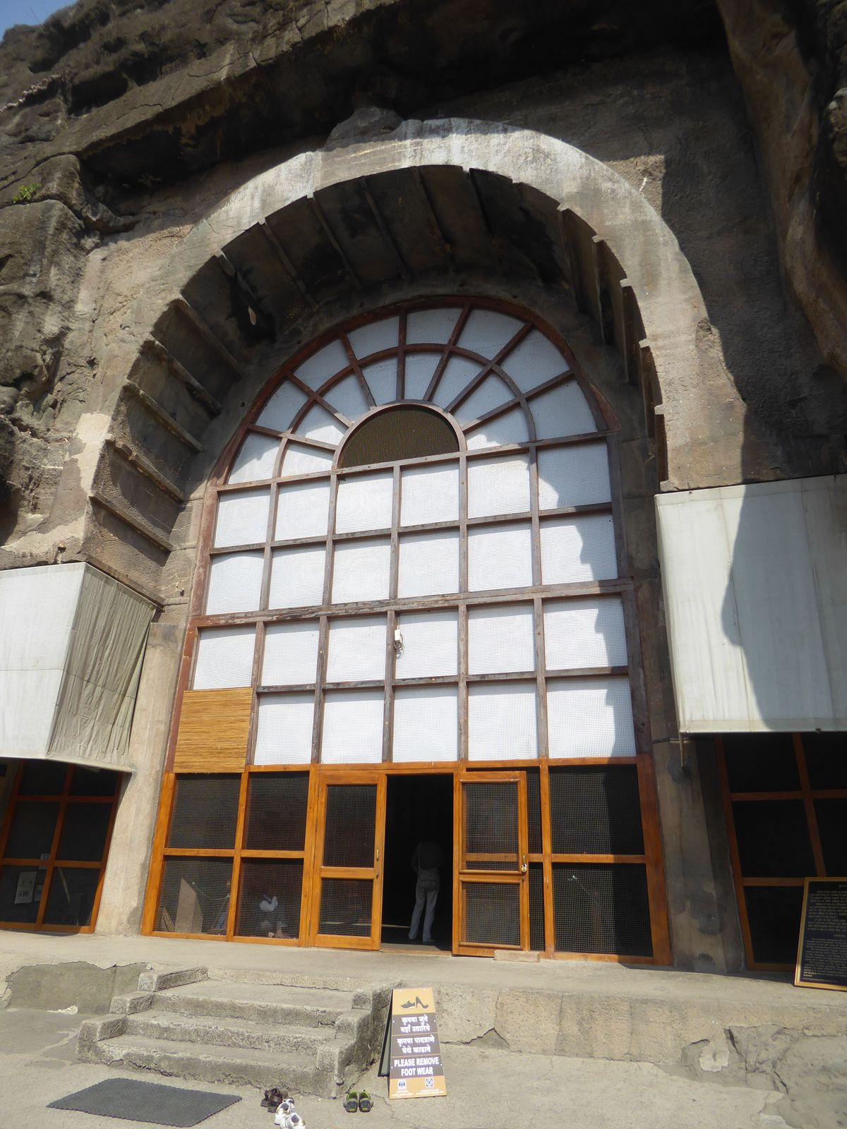 It's a century older than 9, much bigger, and with a much plainer facade because it was originally faced with wood. The wood may have been a