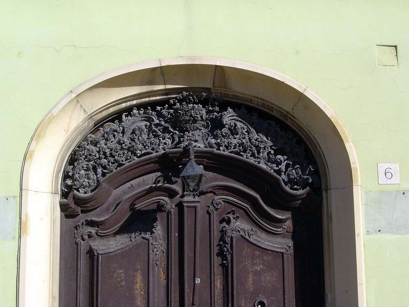 Relatively, because ornament is not wholly suppressed.