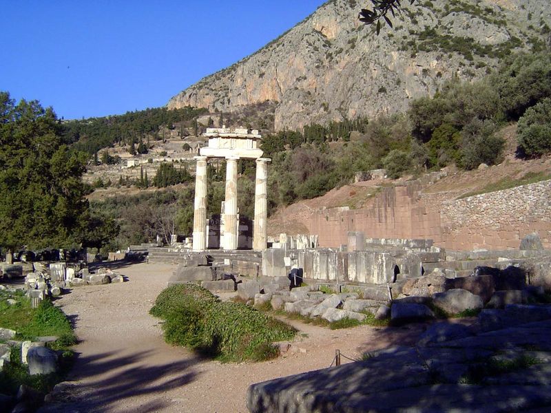 We're dropped down here to the Tholos "Dome" of the sanctuary of Athena Pronaea "before the temple". This circular and domed structure was b