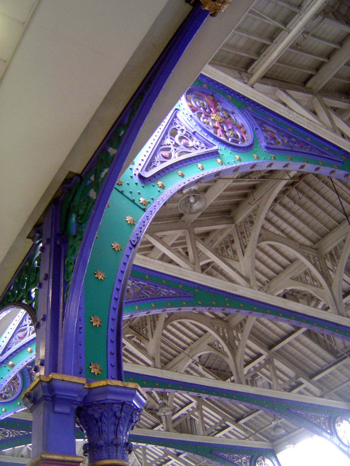 Pevsner asks: "Need the C19 ironwork have been painted so gaudily?" 1;339.