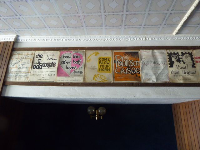 Posters in the civic center's theater.