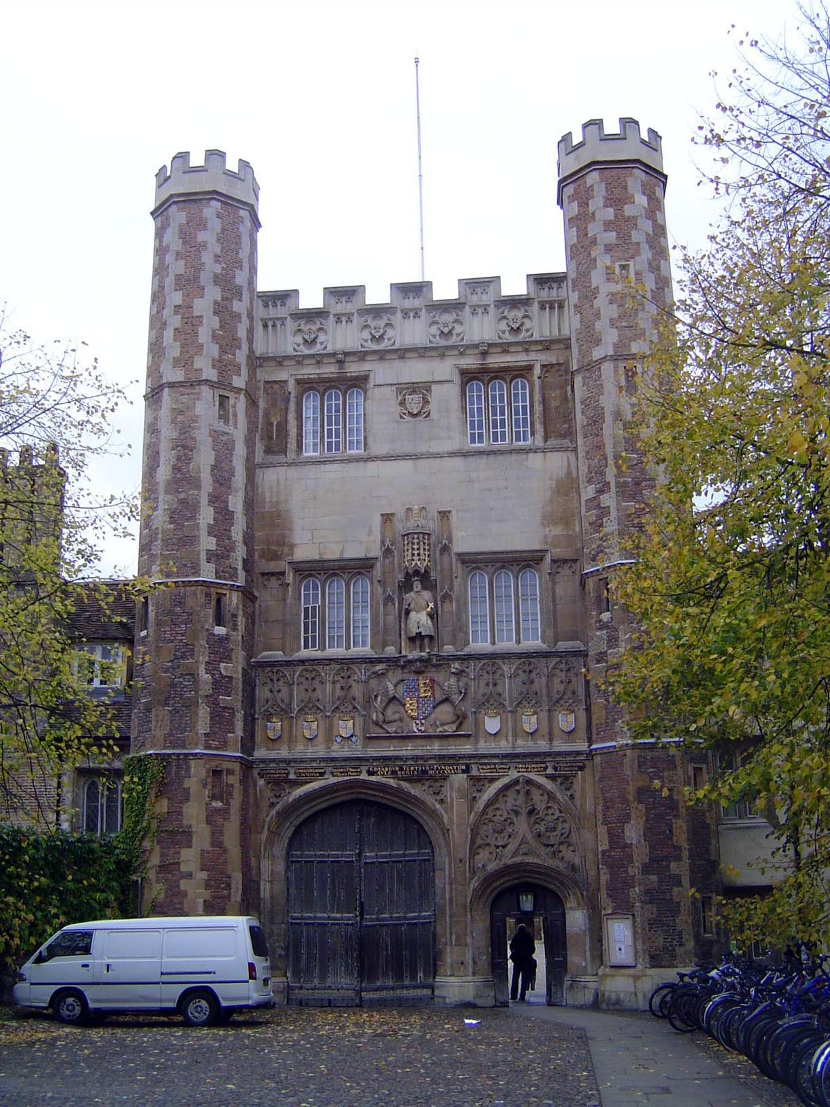 Henry VIII stands watch over Trinity College's Tudor Gate. It was he who created the college by merging two preexisting ones.