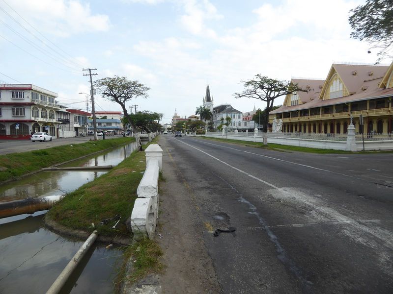 A block inland is Main or High Street, now called Avenue of the Republic. The mid-street drain is a common feature, though some in town have