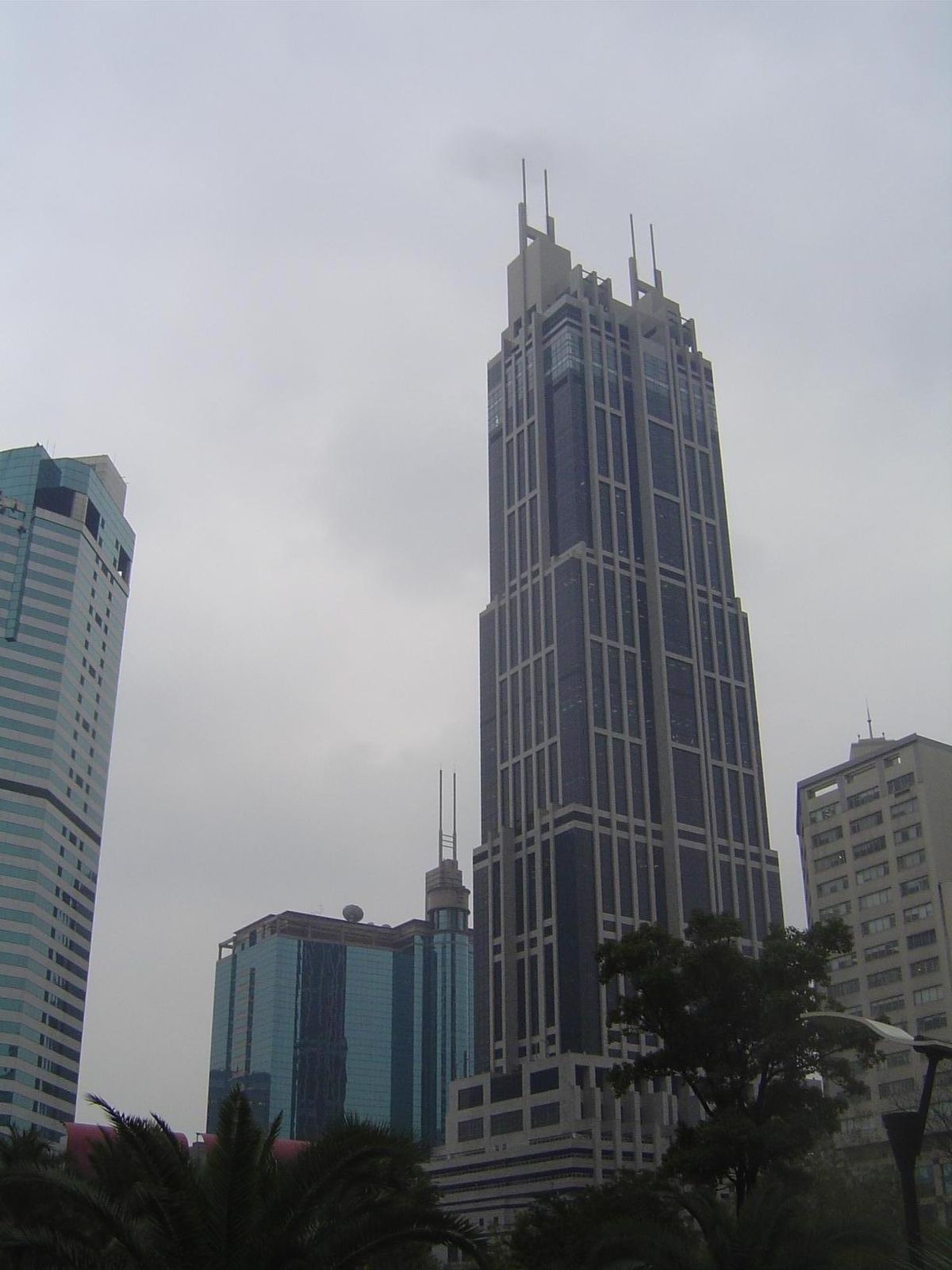 Here, south of People's Park—and only a mile from the old Chinese city, is the Hong Kong New World Tower, whose occupants include Dupont, Fu
