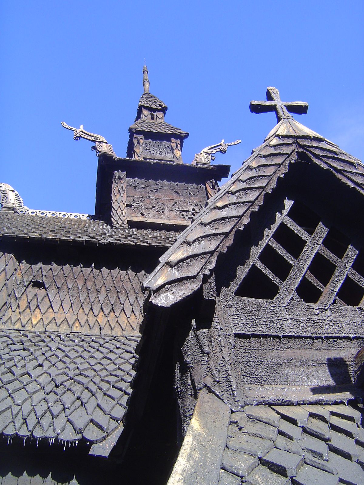 Stave churches were repeatedly tarred for protection from the elements. After a while, the surface becomes deeply alligated.