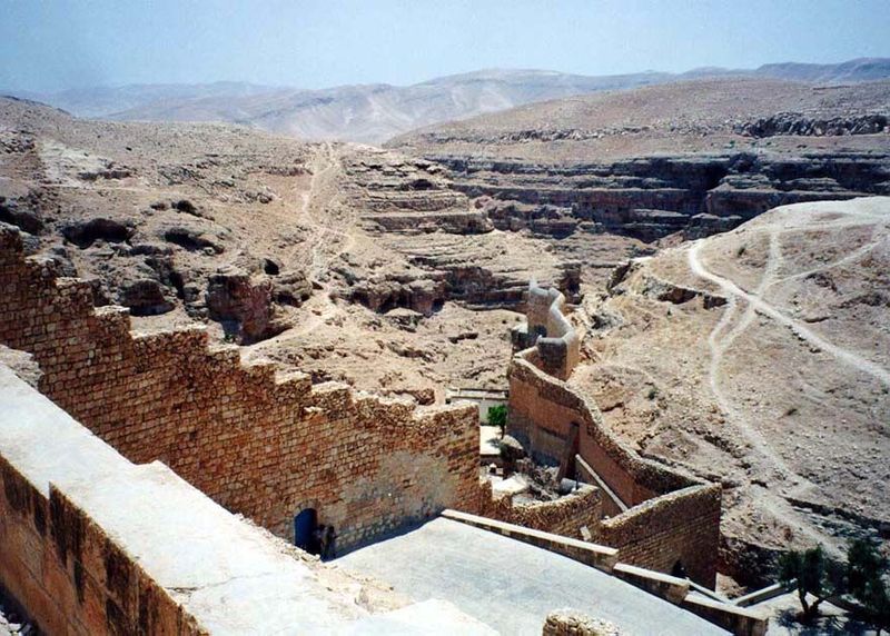 The outer wall of Mar Saba is built into the right-bank canyon wall. Wadi Nar continues to the Dead Sea; another of its pronounced zigzags c