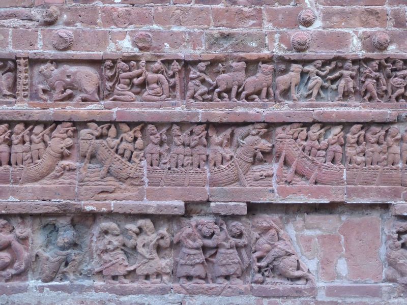 Time for the wider world. Ghosh writes that "ships with animal-headed prows evoke that international maritime trading activity on the temple