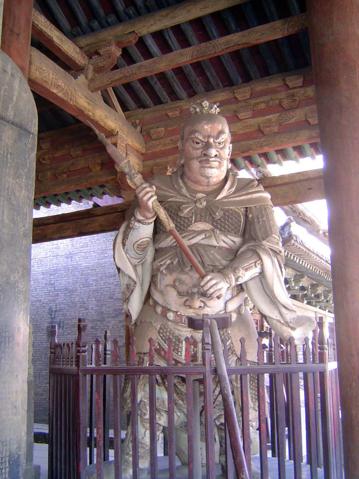 A painted-clay guardian statue, an original from the Song Dynasty. Note the wind-blown sleeves.