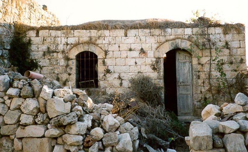 Another house: newer, of dressed stone, and in slightly better condition.