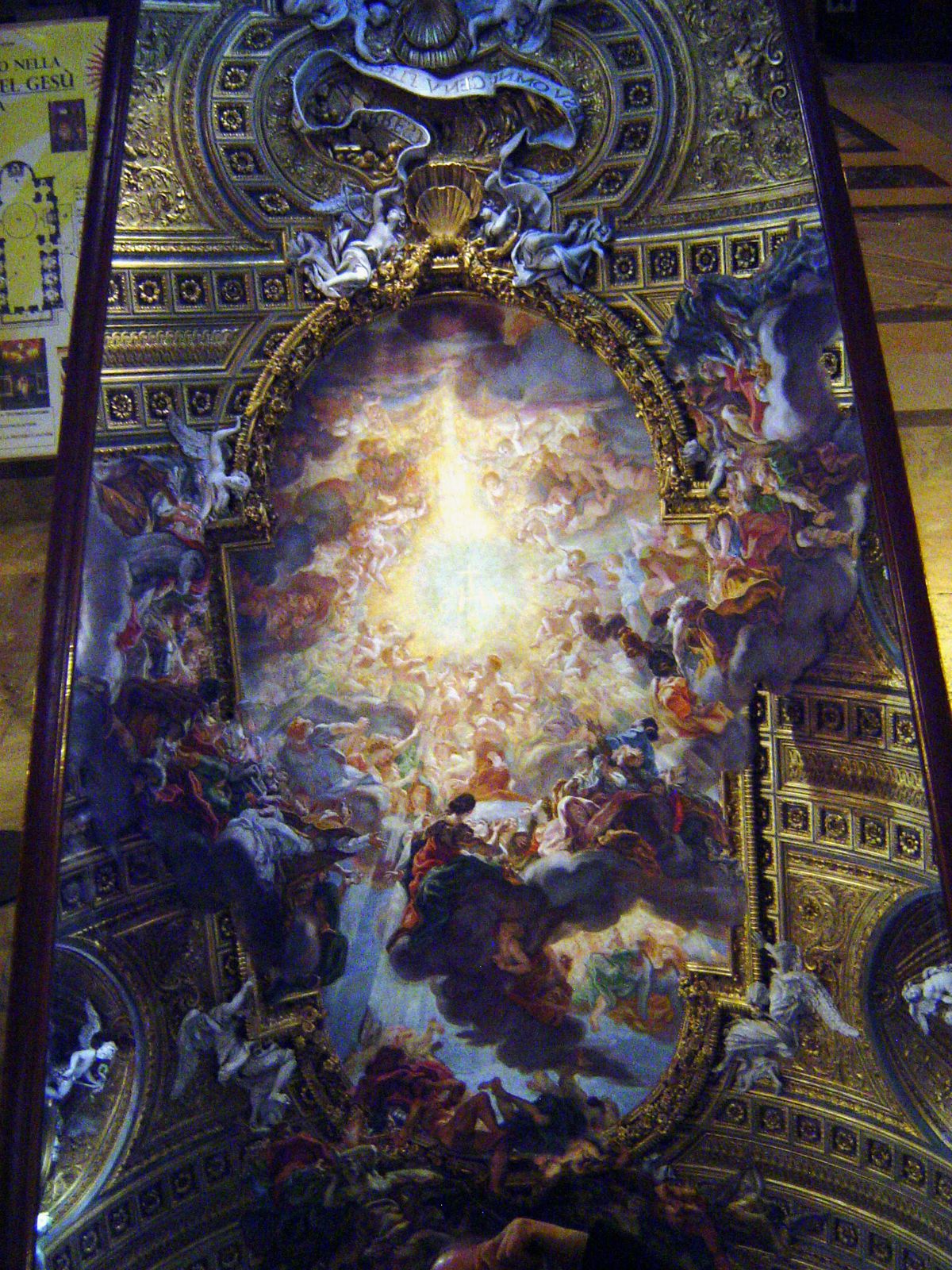 A mirror is positioned on the floor so visitors can see the ceiling without craning.