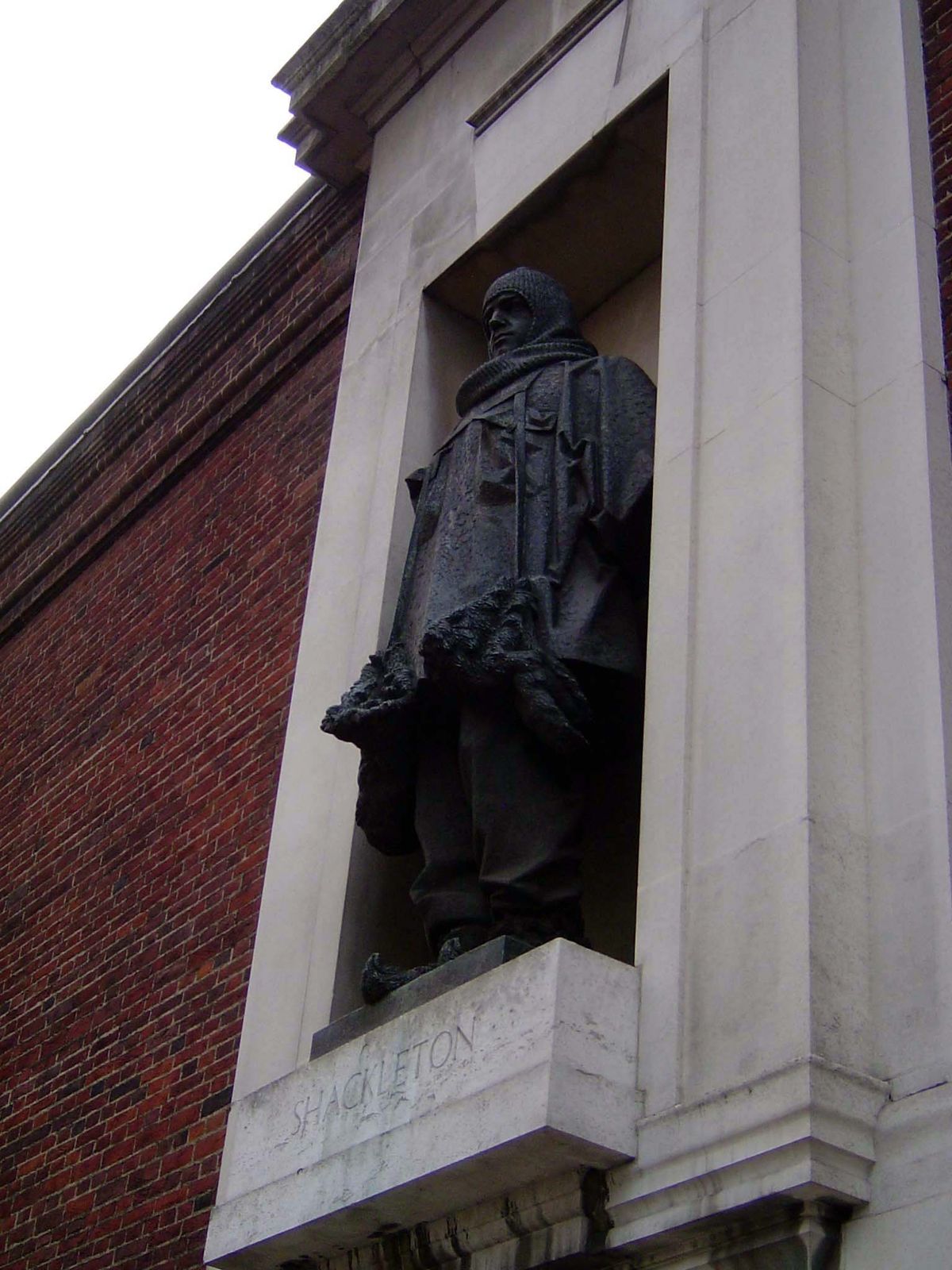Just around the corner but decades earlier a statue of Ernest Shackleton was unveiled in 1932. He is bundled up against the Antarctic blast,