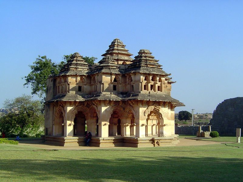 The best-known building within is the Lotus Mahal, with nine pyramid-shaped roofs. Despite its name, bestowed about 1910 by the Archaeologic
