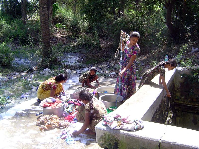 Hoisting water for the washing.