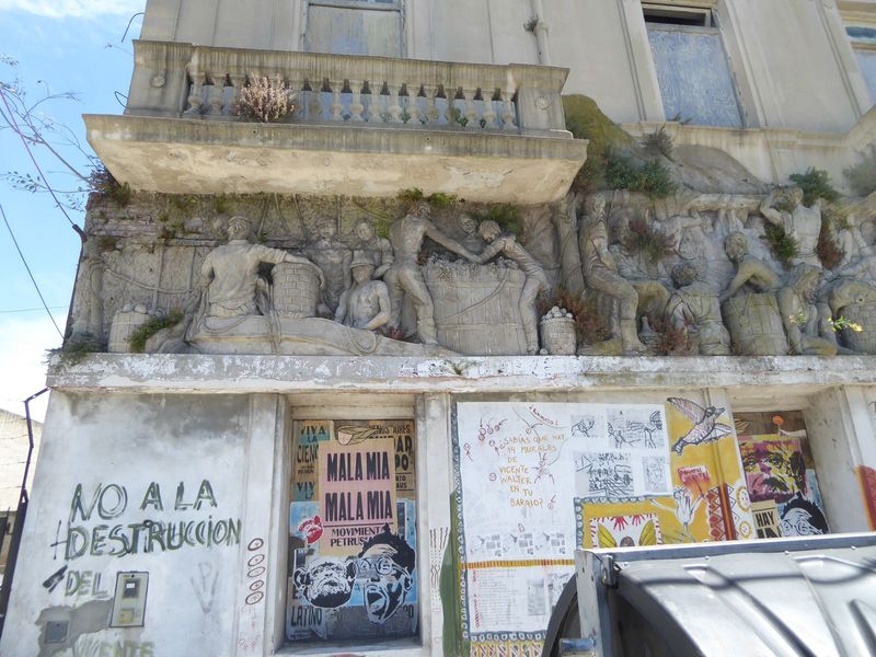 It's this frieze, which wraps the old Southern Maritime Supply Building, and it's about real men doing real work. As the graffito says, ther