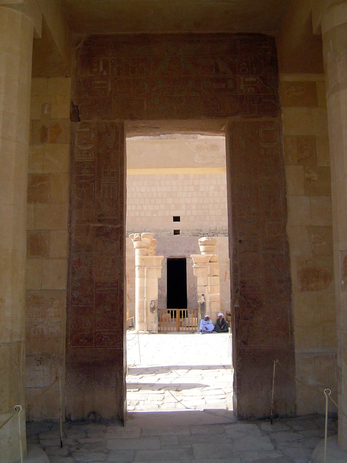 The upper colonnade has a doorway into the upper terrace and its chapel, here in the distance.