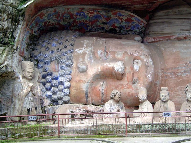 At the head of the line is the curly-headed Zhao Zhifeng, who faces the cult founder, Liu Benzun.