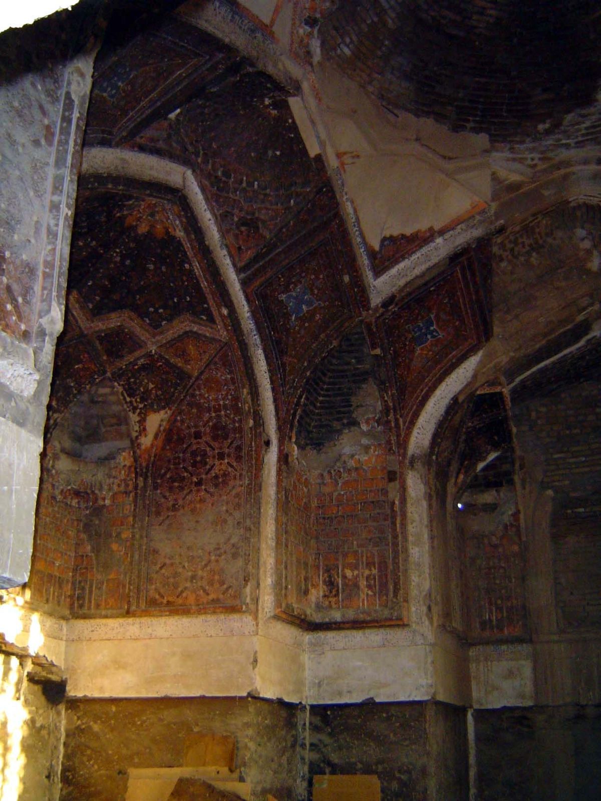 Up above, hints of the once elaborate decoration.