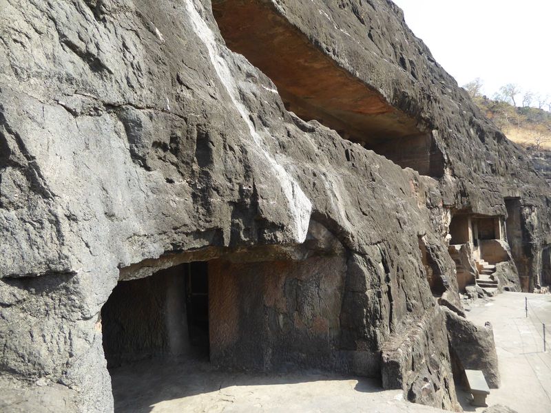 We'll take a look now at the viharas, starting with these unfinished ones between 20 and 21. The general pattern was to dig a tunnel, then c