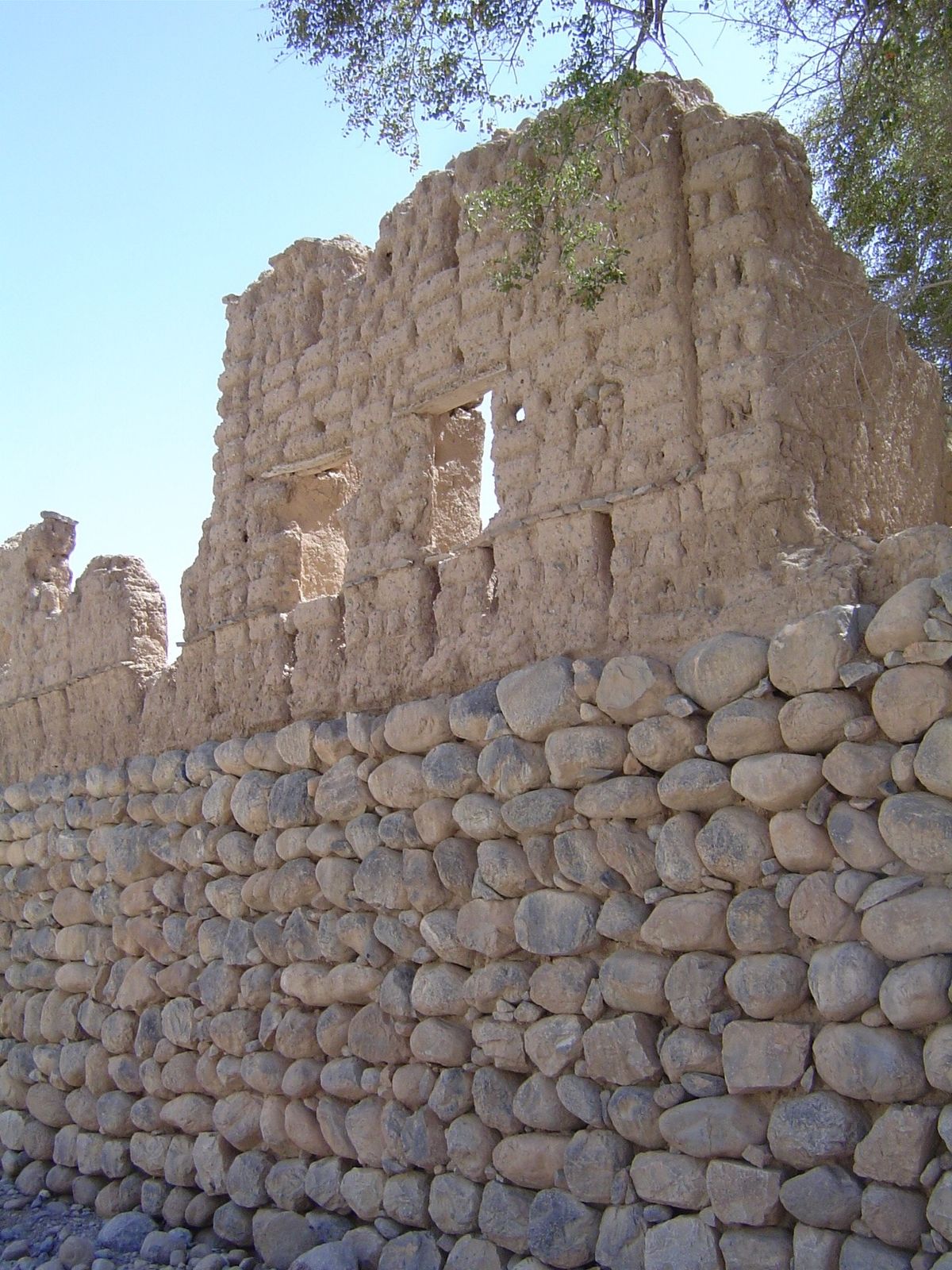 There's an abandoned village where the wadi leaves the mountains. Typical construction: cobblestone base, mud-brick superstructure.