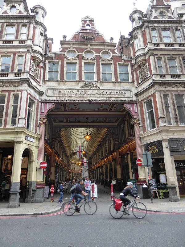 One of the market's entrances. Ever succinct, Pevsner writes: "Tall, narrow gabled houses of brick in C17 Dutch taste, with slim tourelles p