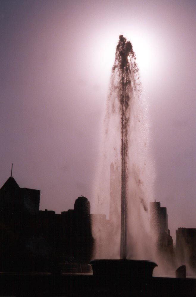 Periodically, the fountain erupts in the breeze. The view here is from the other side, looking east, toward the city center.