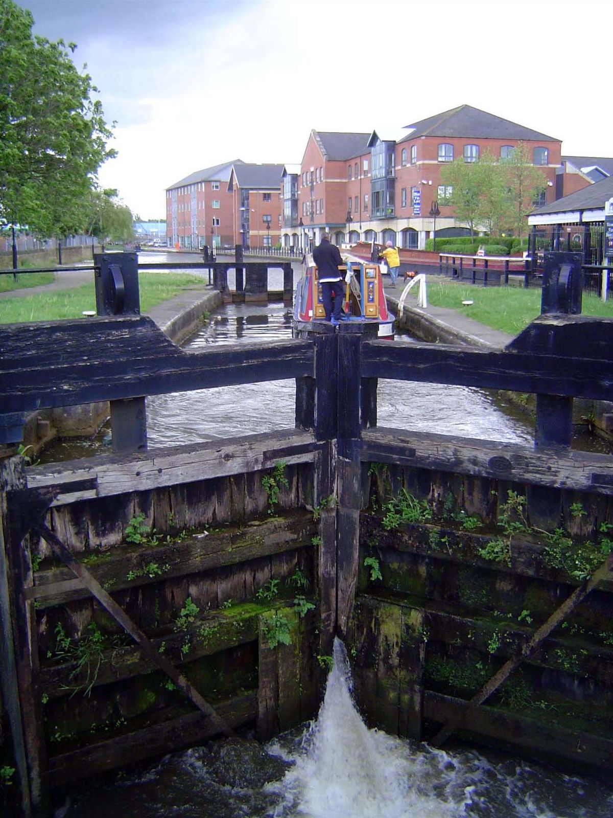 Five minutes later, the lock is full; the lower gate is tight, and the upper one swings free.