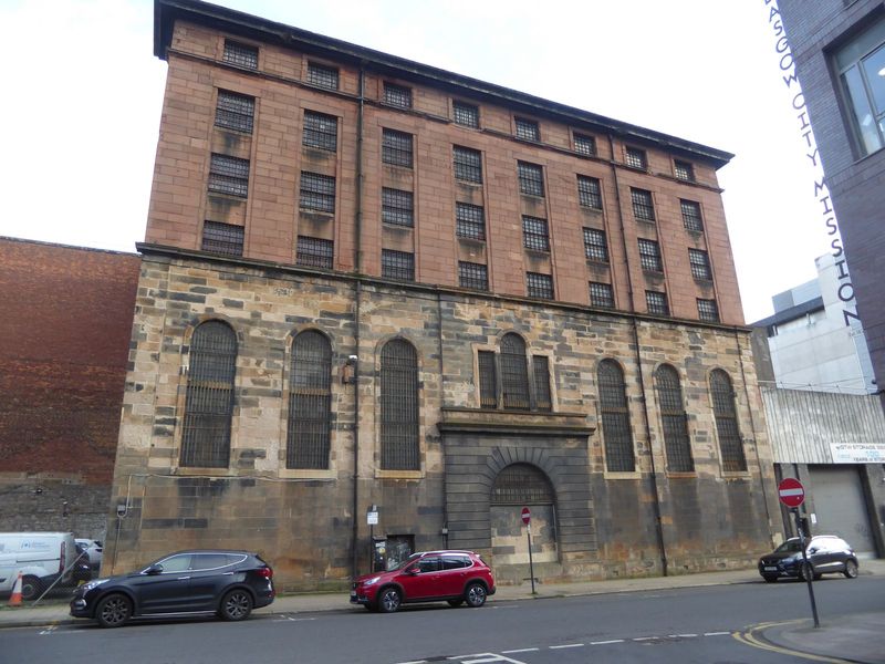 Here's the back of the same building, which has a T-shaped footprint. The building is now a commercial storage company where the likes of th