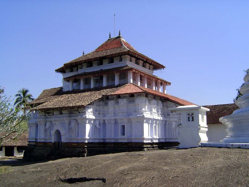 The structure is of brightly whitewashed brick—not stone, like neighboring Gadaladeniya. It was built in 1344, during the Gampola Empire and