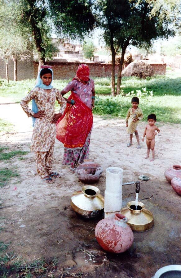 Village women now have piped water.
